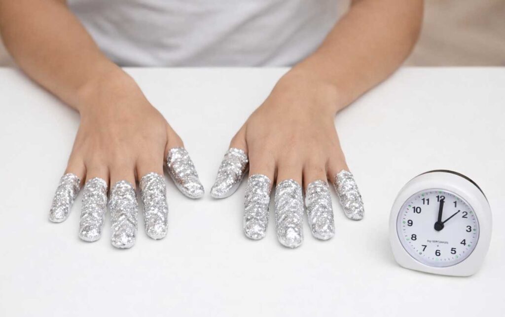 wrap your nails in foil
