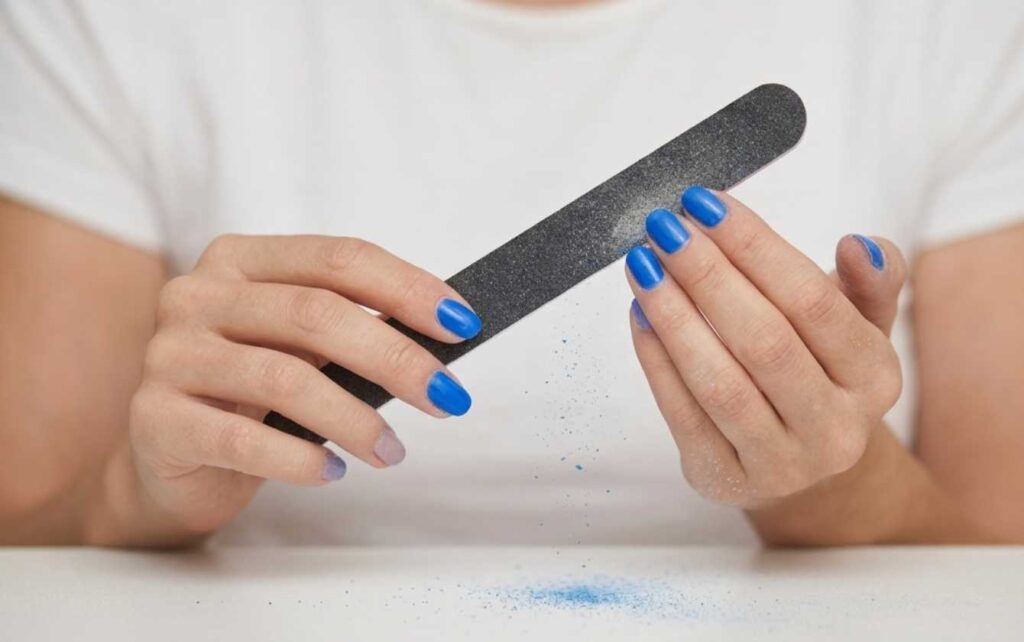 file the top layer of nails